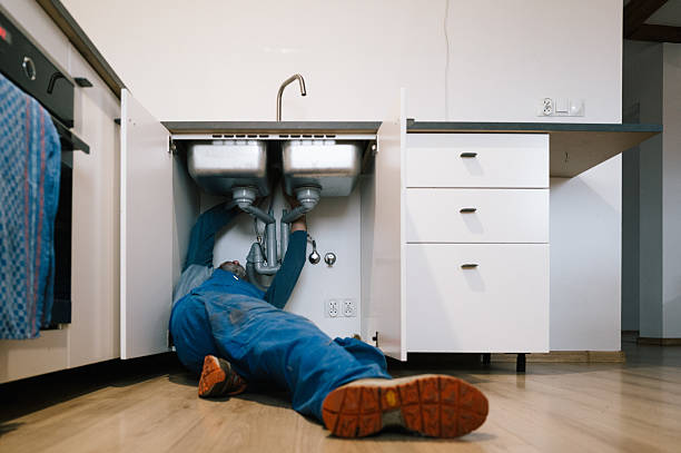 Professional Drain Cleaning technician working in Girard, KS